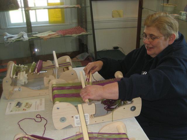 24 Cindy Lynch trying her hand at weaving 4-16-16.jpg